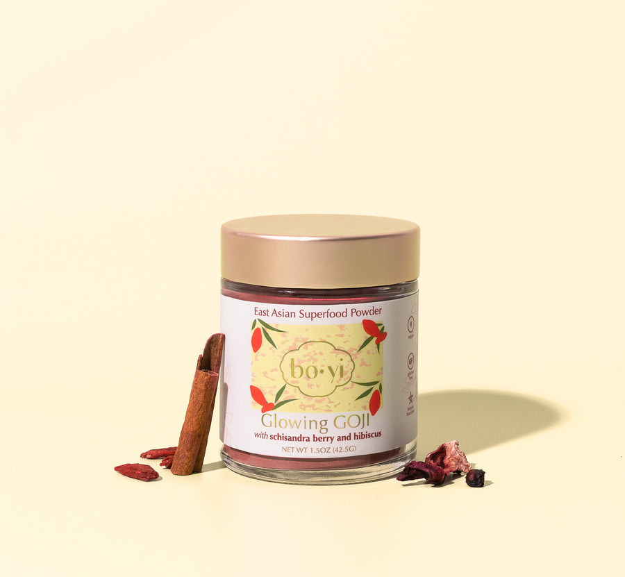 glowing goji berry herbal powder blend with schisandra berry, hibiscus, goji berry, cinnamon, and beetroot